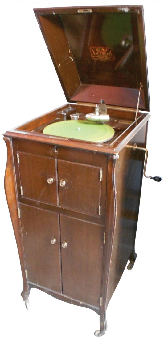Victrola, Victor Talking Machine, floor model, VV-XI 75: Victrola, Victor Talking Machine, floor model, VV-XI 757301, good wood cabinet, Good working cond, some records included, 44"H x 20"W x 22.5"D.