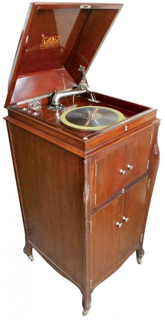 Victrola, Victor Talking Machine, floor model VV-V1V 59: Victrola, Victor Talking Machine, floor model VV-V1V 59165E, nice wood cabinet, VG working cond, some records included, 48.5"H x 22.5"W x 23.5"D.
