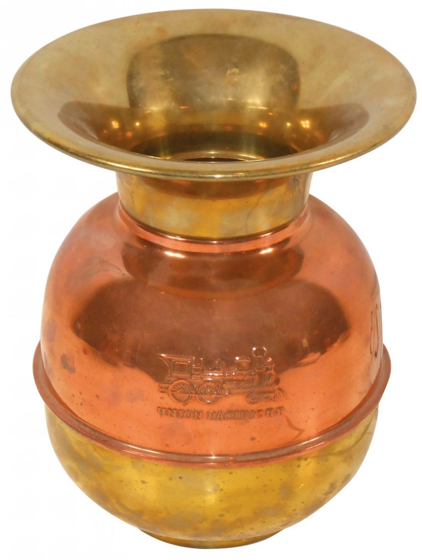 Railroad spittoon, Union Pacific Railroad copper & bras: Railroad spittoon, Union Pacific Railroad copper & brass spittoon w/raised steam engine logo, weighted, VG cond, 11"H, 9" flare at top tapering to a 4" opening.