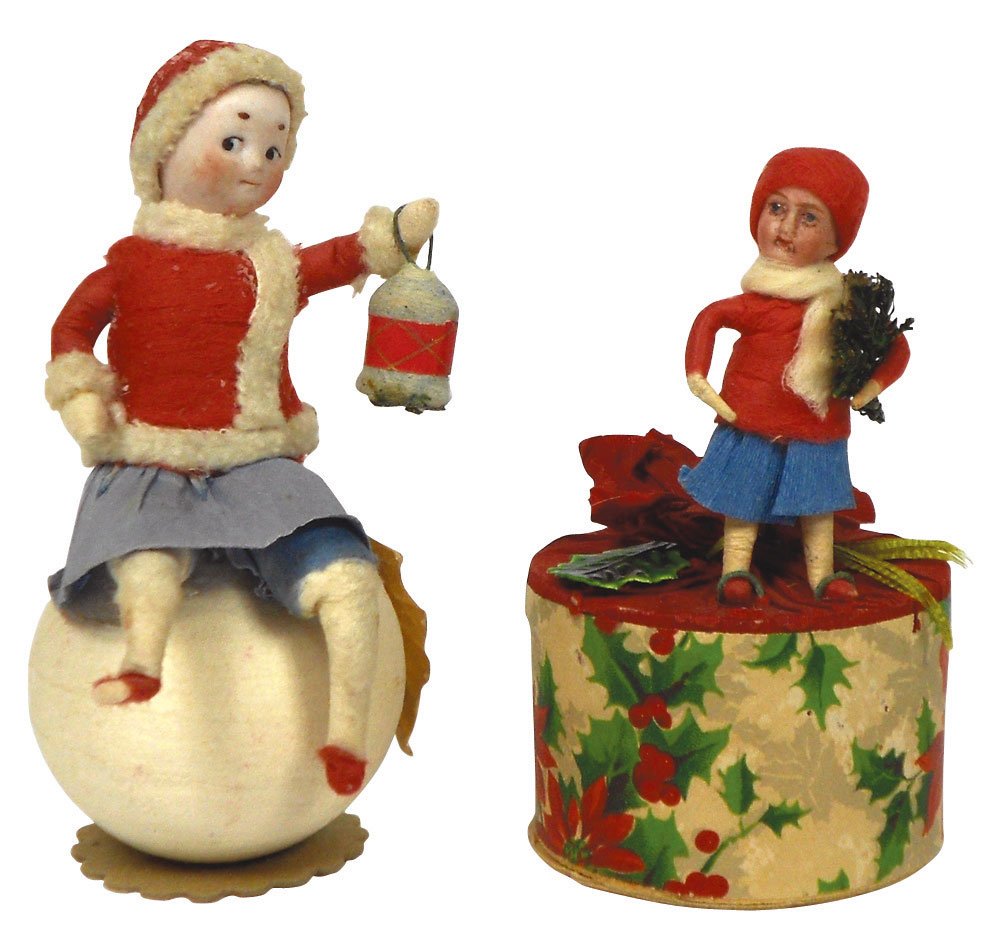Christmas candy containers (2), young girl w/feather tr: Christmas candy containers (2), young girl w/feather tree on Christmas box & girl on snowball, both w/spun cotton & crepe clothing & painted bisque faces, both Exc cond, 4" & 4.5"H.