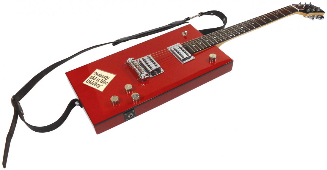 Guitar, Gretsch Electromatic "Bo Diddley", comes w/blac: Guitar, Gretsch Electromatic "Bo Diddley", comes w/black leather strap w/coin marked Red Monkey-Los Angeles, Exc cond, 40"L x 9.25"W.