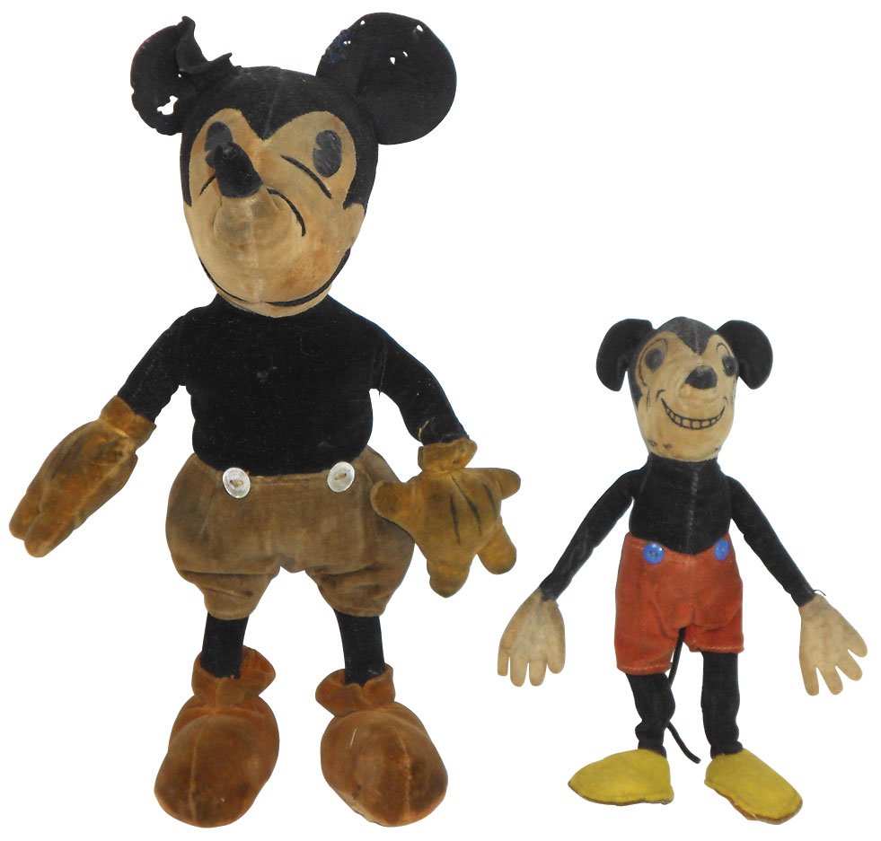 Mickey Mouse dolls (2), both velvet, smaller one w/5 fi: Mickey Mouse dolls (2), both velvet, smaller one w/5 finger felt hands is marked Reg. No. 750611, Exc cond w/some soil, 6"H, larger one has mother-of-pearl buttons, VG cond w/missing tail & some loss 