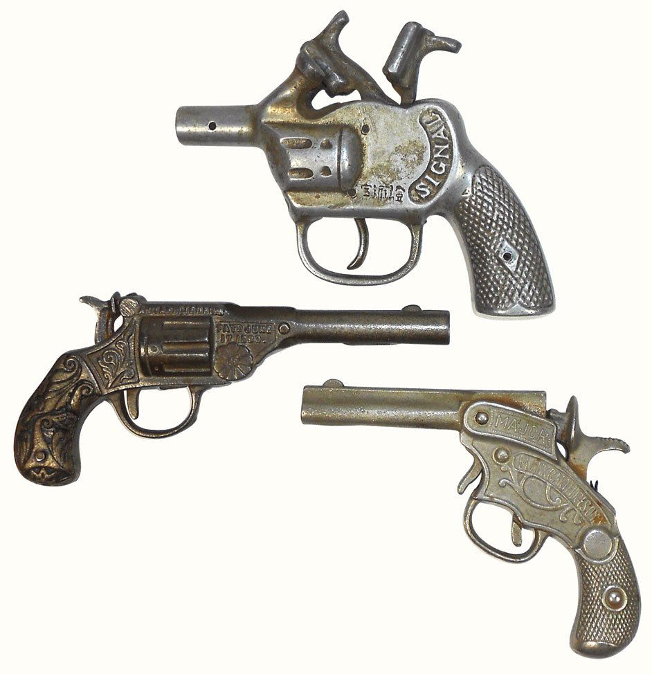 Toy cap guns (3), unknown Daisy, pat'd June 17, 1890, c: Toy cap guns (3), unknown Daisy, pat'd June 17, 1890, cast iron, Exc cond, 7"L, unknown Signal w/2 hammers, aluminum, unusual, non-working cond, 6.5"L & Major, cast iron, non-working cond, 6.5"L.