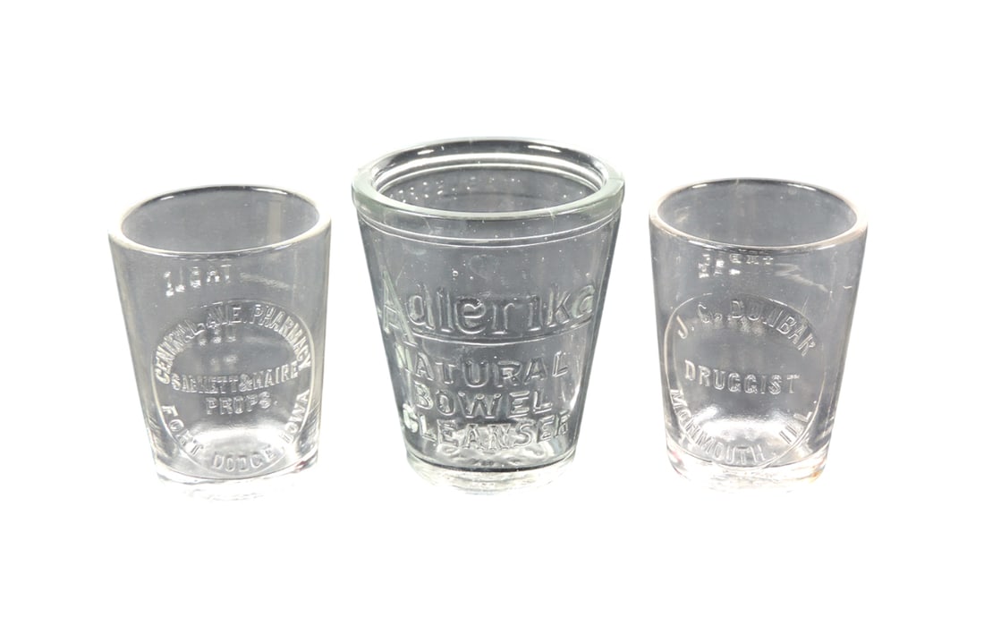 Drug Store Advertising Dose Glasses (3), glass embossed Adlerika Natural Bowel Cleanser/numbering...: Drug Store Advertising Dose Glasses (3), glass embossed Adlerika Natural Bowel Cleanser/numbering measurements, glass embossed J.C. Dunbar Druggist Monmouth, Ill./table/tea/dessert & glass embossed Ce