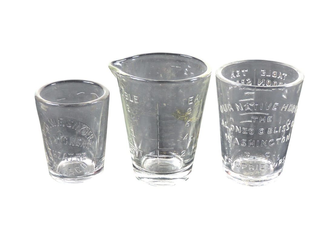 Drug Store Advertising Dose Glasses (3), glass embossed Our Native Herbs, The Alonzo O. Bliss Co....: Drug Store Advertising Dose Glasses (3), glass embossed Our Native Herbs, The Alonzo O. Bliss Co., Washington D.C. Proprietors, glass embossed w/table/tea/dessert & numbering measurements, pour spout 