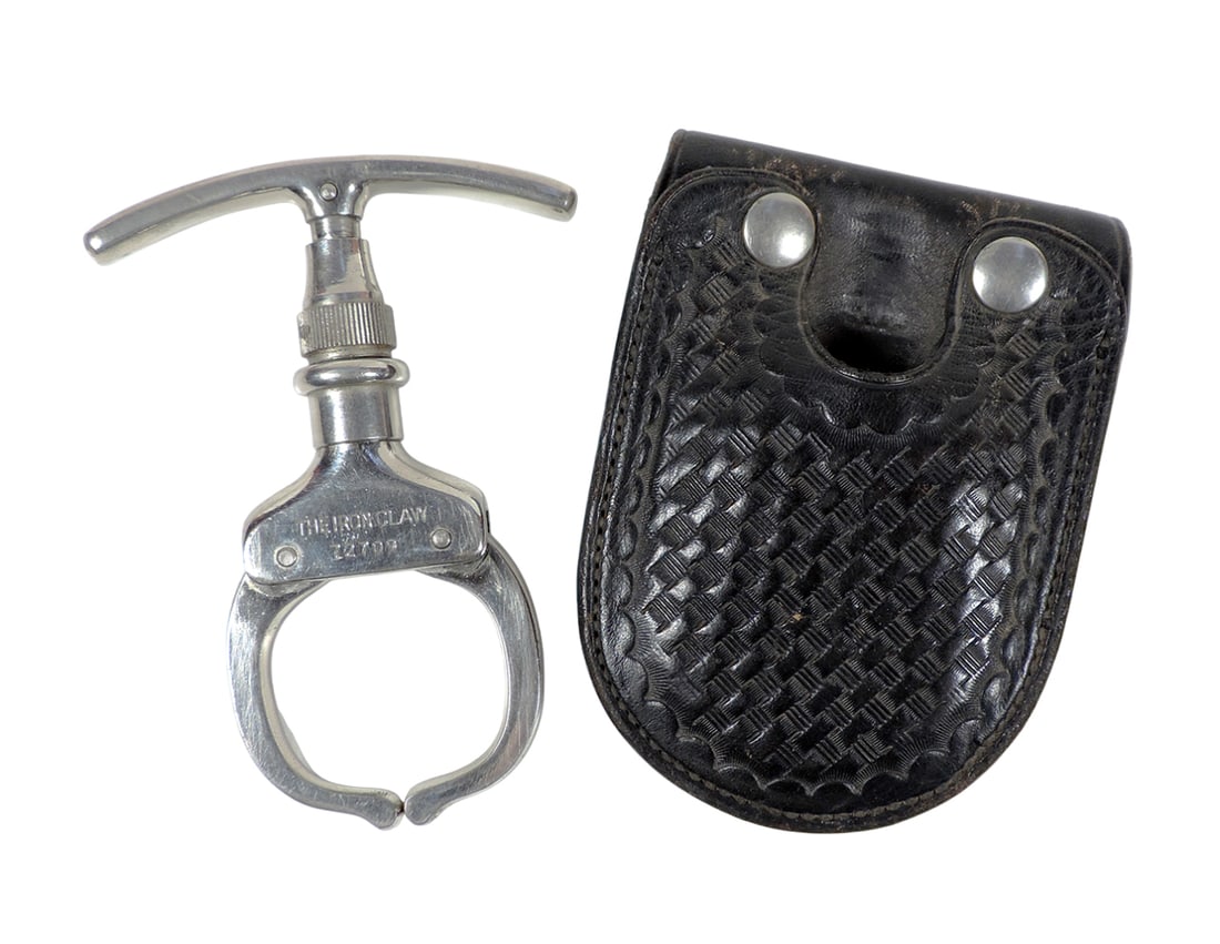 The Iron Claw, 72709, single-wrist restraint used by law enforcement also known as "handcuff nipp... (1 of 3)