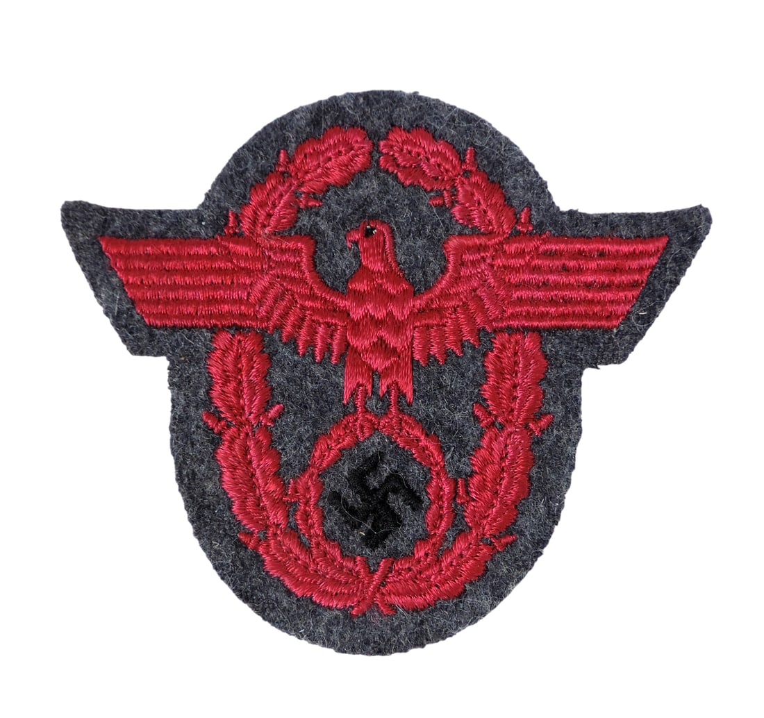 German Fire Protection Police NCO's Eagle Sleeve Patch-WWII, features an eagle w/a swastika withi...: German Fire Protection Police NCO's Eagle Sleeve Patch-WWII, features an eagle w/a swastika within an oak leaf wreath, c. early 1900s, embroidered on black felt, Exc cond, H 3 x W 3.5 in.