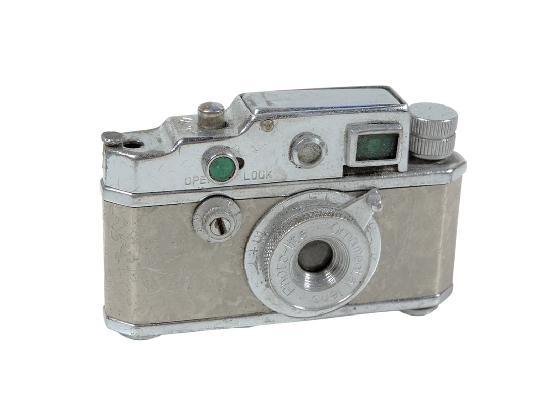 Camera-Shaped Cigarette Lighter, embossed Made In Occupied Japan, metal, Exc cond w/working mecha...: Camera-Shaped Cigarette Lighter, embossed Made In Occupied Japan, metal, Exc cond w/working mechanism, H 1.5 x W 2.5 in.