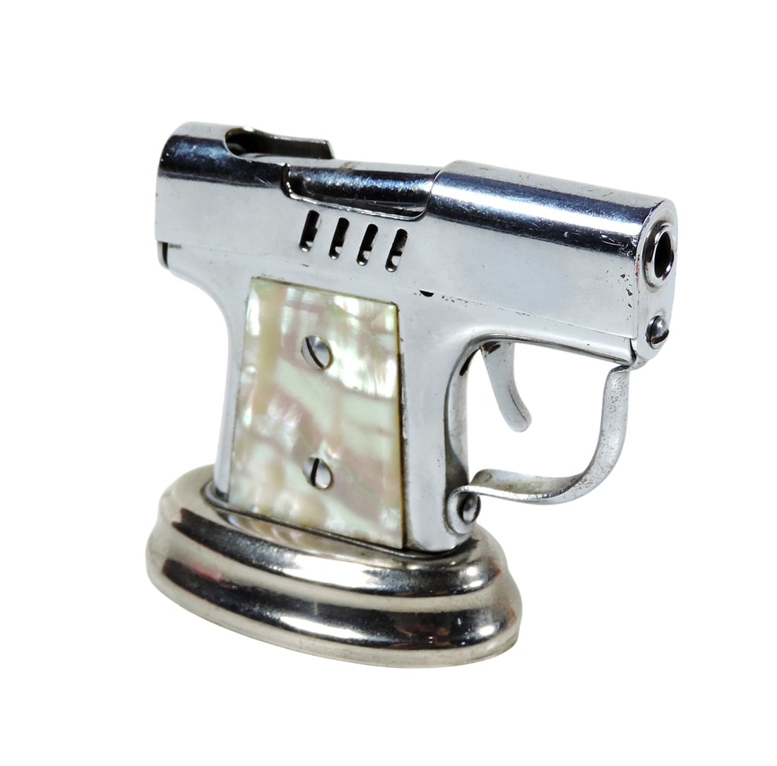 Vintage Novelty Pistol-Shaped Cigarette Lighter, mother-of-pearl handle/silver-toned finish, embo...: Vintage Novelty Pistol-Shaped Cigarette Lighter, mother-of-pearl handle/silver-toned finish, embossed Made In Occupied Japan, Continental New York, metal, Exc cond w/working mechanism, H 2.5 x W 3 in.