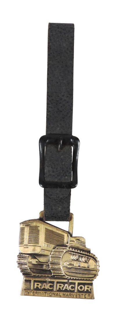 International Harvester Watch Fob, leather strap w/buckle, embossed Trac Tractor International Ha...: International Harvester Watch Fob, leather strap w/buckle, embossed Trac Tractor International Harvester on front, back embossed advertising for Herman M. Brown Co., Des Moines, Iowa, Made in USA, c.