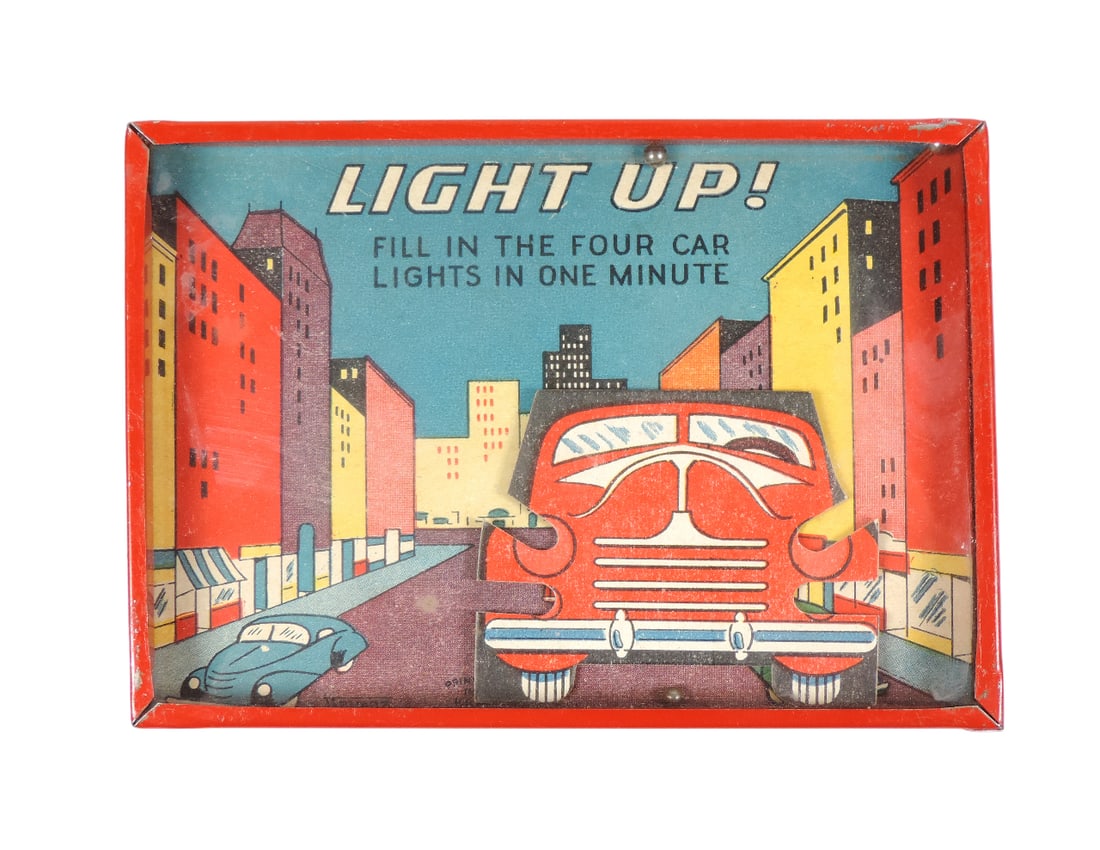 Automotive Dexterity Game, Colmor, Light Up! Fill In The Four Car Lights In One Minute, objective...: Automotive Dexterity Game, Colmor, Light Up! Fill In The Four Car Lights In One Minute, objective is to roll four silver balls into the headlight recesses while the car backdrop moves independently in