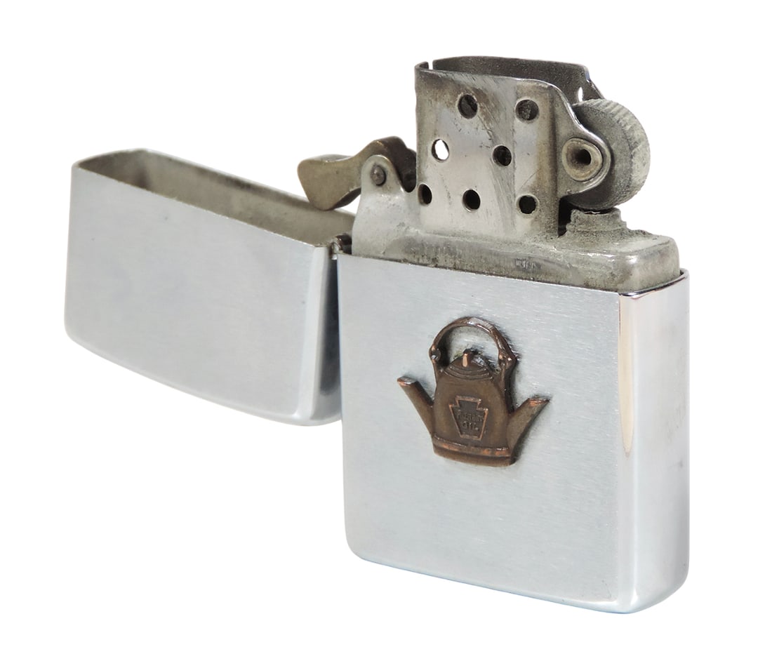 Forest Oil ZIPPO Lighter, embossed ZIPPO Bradford, PA, flint wheel spins freely, possibly brass, ...: Forest Oil ZIPPO Lighter, embossed ZIPPO Bradford, PA, flint wheel spins freely, possibly brass, pictures oil can w/Forest Oil on front, VG cond w/age-related wear to mechanism, H 2.25 in.