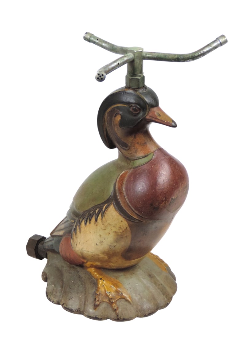 Duck Lawn Sprinkler, Wood Duck, embossed NUYDEA, Patent D-8309, cast iron w/brass fittings for hose (1 of 4)