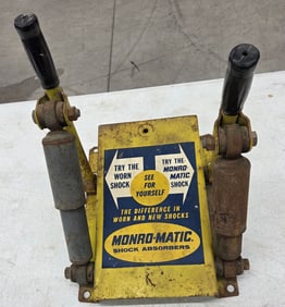 Vintage Sign for Monro-Maic Shock Absorbers. "Compare worn out shock absorber with new Monro-Matic