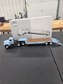 Diecast Toy, Mack 1960 Model B-61 Tandem Axel Tractor With Lowboy Trailer (First Gear) NIB