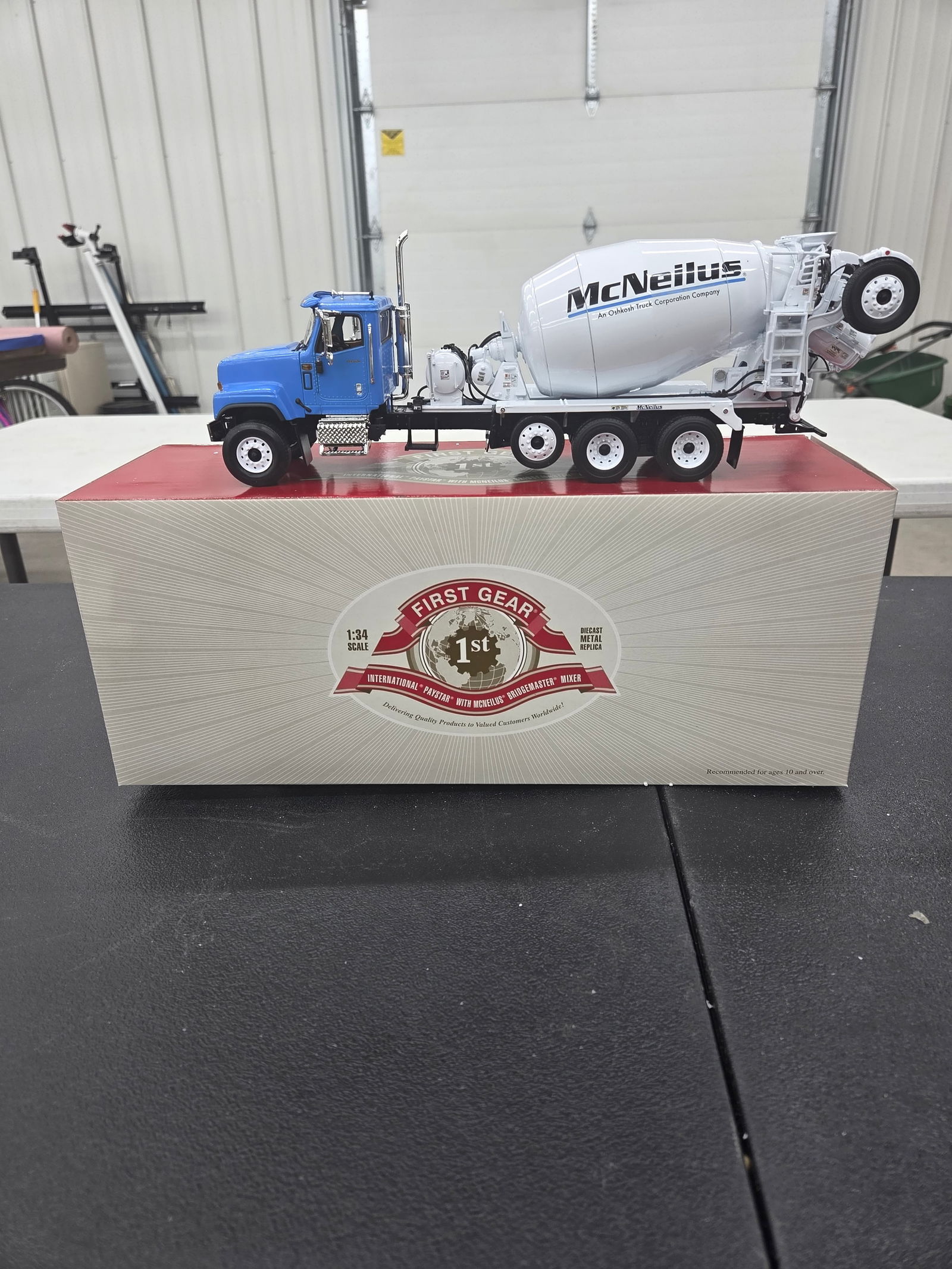 Diecast Toy, International Paystar /w Mcneilis BridgeMaster Mixer (McNEILUS). An Oshkosh Truck: Diecast Toy, International Paystar /w Mcneilis BridgeMaster Mixer (McNEILUS). An Oshkosh Truck Corporation Company. First Gear NIB