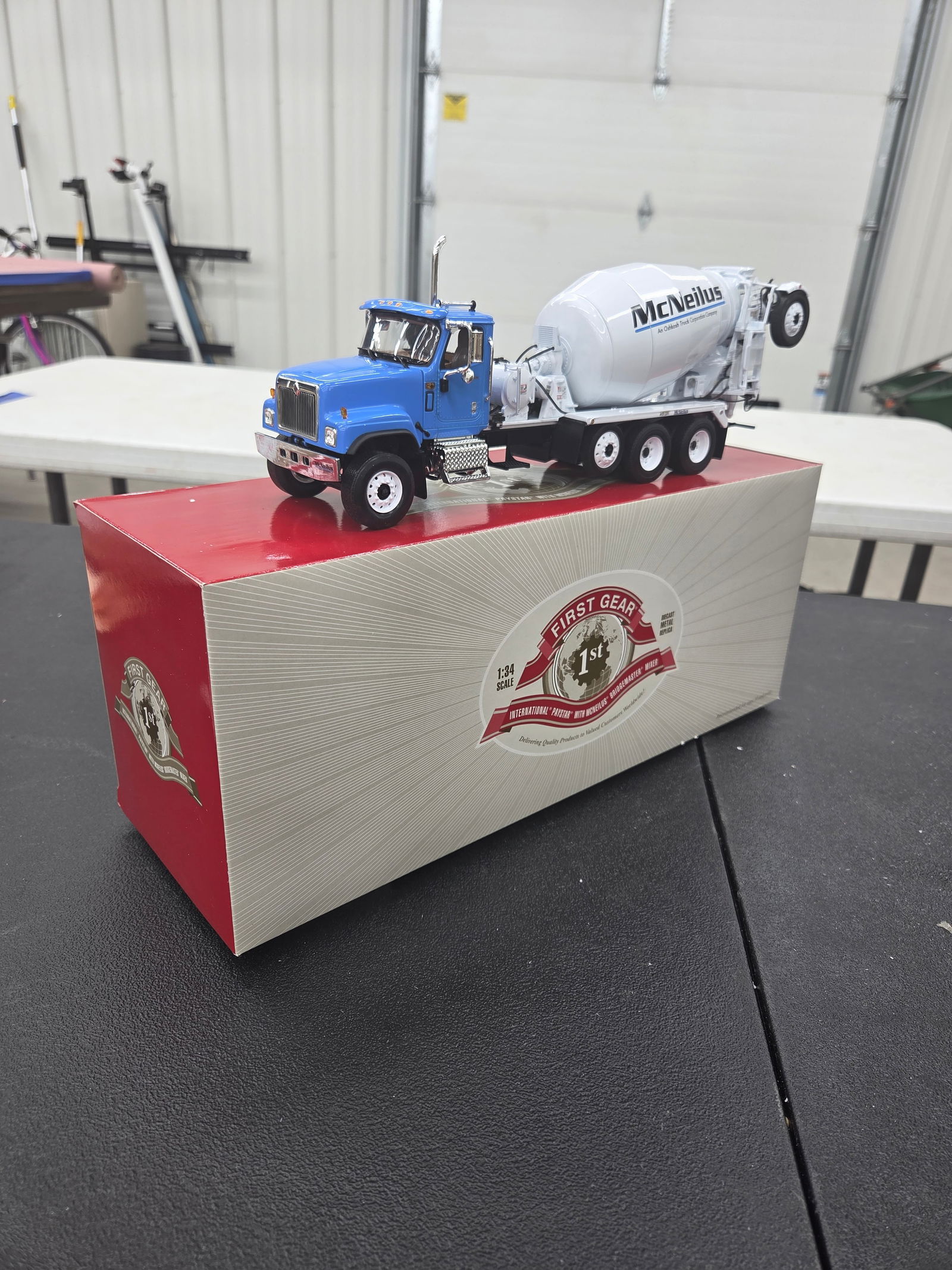 Diecast Toy, International Paystar /w Mcneilis BridgeMaster Mixer (McNEILUS). An Oshkosh Truck: Diecast Toy, International Paystar /w Mcneilis BridgeMaster Mixer (McNEILUS). An Oshkosh Truck Corporation Company. First Gear NIB