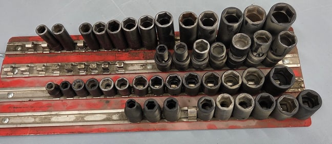 Impact 6 point deep sockets, includes standard 6 point sockets and a set of 6 point swivel sockets.