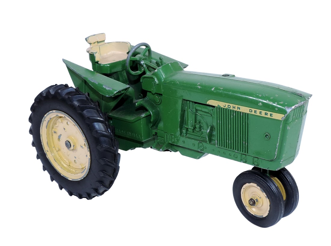 Toy John Deere Tractor, Model 3020 or 3010, Ertl Company, 1:16 scale, die-cast/hard plastic, embo...: Toy John Deere Tractor, Model 3020 or 3010, Ertl Company, 1:16 scale, die-cast/hard plastic, embossed Made in USA, some orig paint loss/no muffler, c.mid 1960s, VG orig cond (zoom photos for