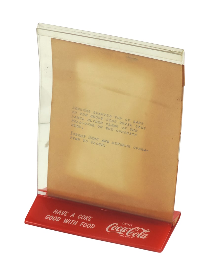 Coca-Cola Tabletop Menu Holder, c.1950s, Have A Coke Good With Good, Drink Coca-Cola, Trade-Mark: Coca-Cola Tabletop Menu Holder, c.1950s, Have A Coke Good With Good, Drink Coca-Cola, Trade-Mark®, plastic, orig insertion instruction sheet included, VG cond w/some warp in top plastic, H 8.5 x