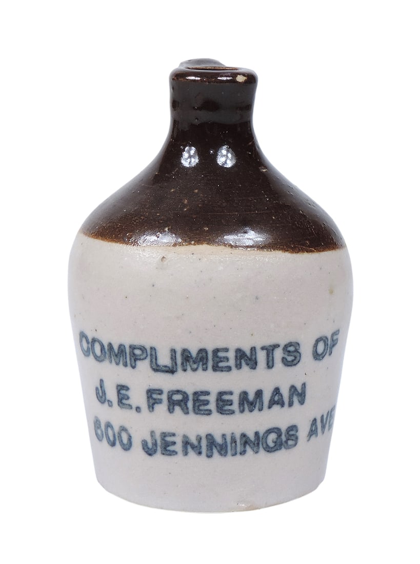 Miniature Advertising Jug, stamped Compliments of J.E. Freeman 600 Jennings Ave, tiny flea bite o...: Miniature Advertising Jug, stamped Compliments of J.E. Freeman 600 Jennings Ave, tiny flea bite on top rim & base, o/all VG+ cond, H 3 x D 1.75 (base) in. 