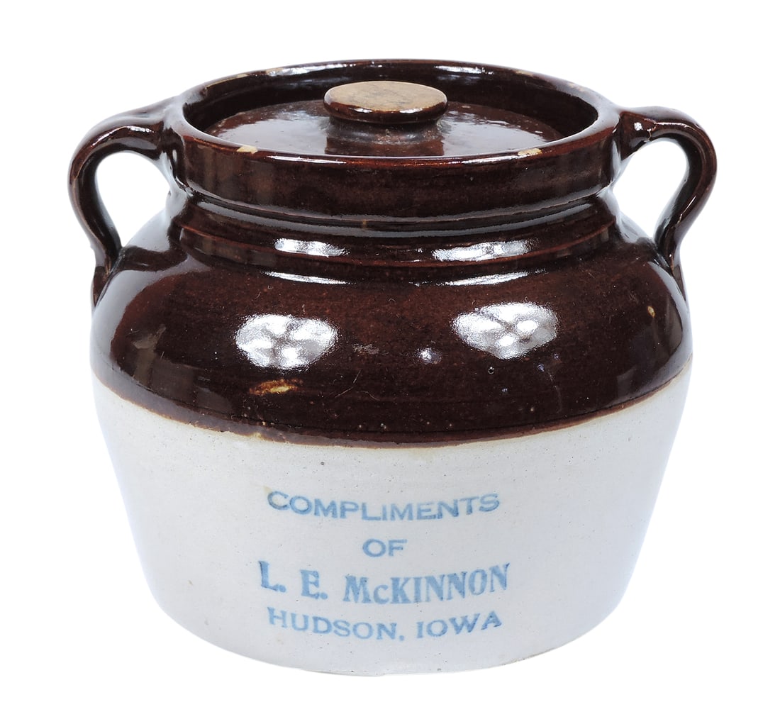 Red Wing Advertising Bean Pot w/Lid, stamped Compliments of L.E. McKinnon-Hudson, Iowa, c. earlie...: Red Wing Advertising Bean Pot w/Lid, stamped Compliments of L.E. McKinnon-Hudson, Iowa, c. earlier 1900s, small chip on back of left handle, o/all VG+ cond, H 6 x D (base) 6 in.