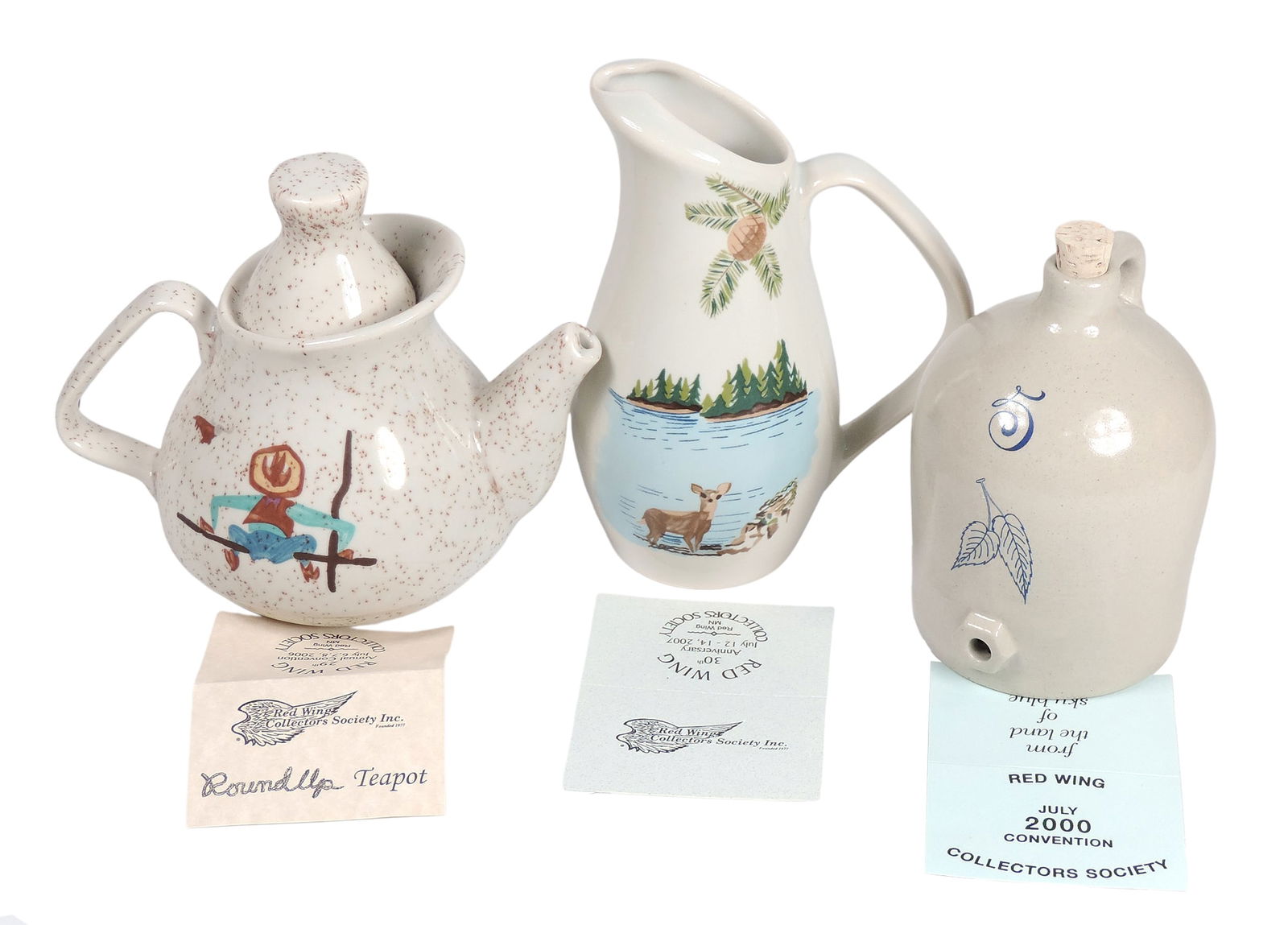 Red Wing Collectors Society Commemoratives (3), 2006 Round Up Teapot w/lid, 2007 Birch Leaf Beehive: Red Wing Collectors Society Commemoratives (3), 2006 Round Up Teapot w/lid, 2007 Birch Leaf Beehive Threshing Jug & 2000 Pitcher, complete w/orig tags & storage boxes, Mint cond, up to H 6.5 in.