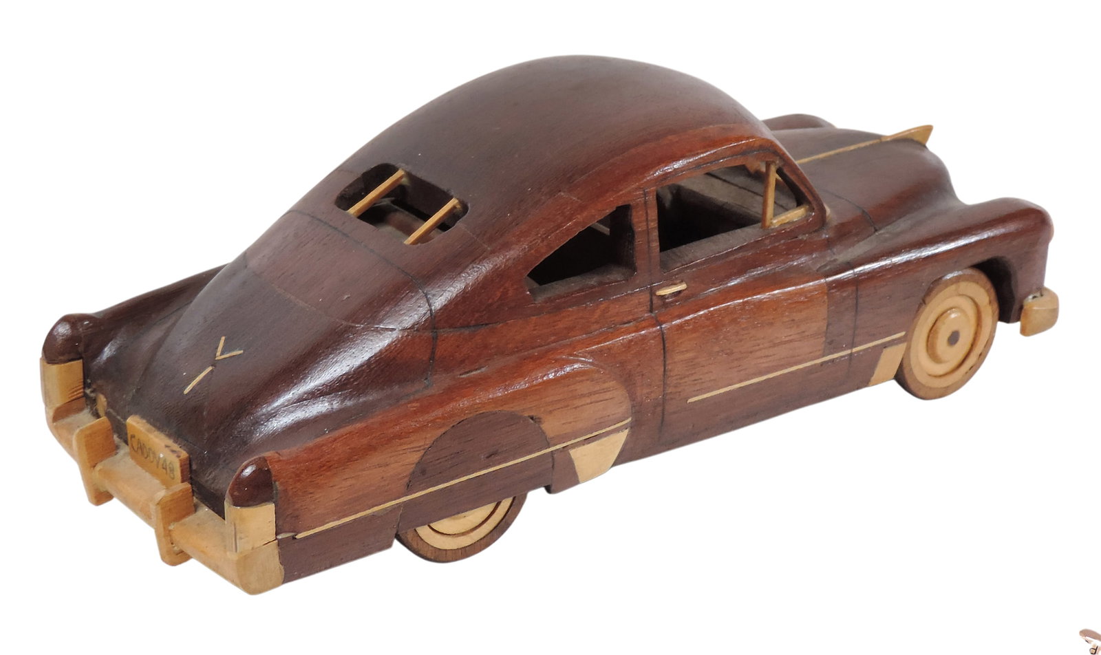 Handcarved Wooden Car Model by the renown carver Harold Kloss, mahogany version of a 1949 Cadillac, - 2