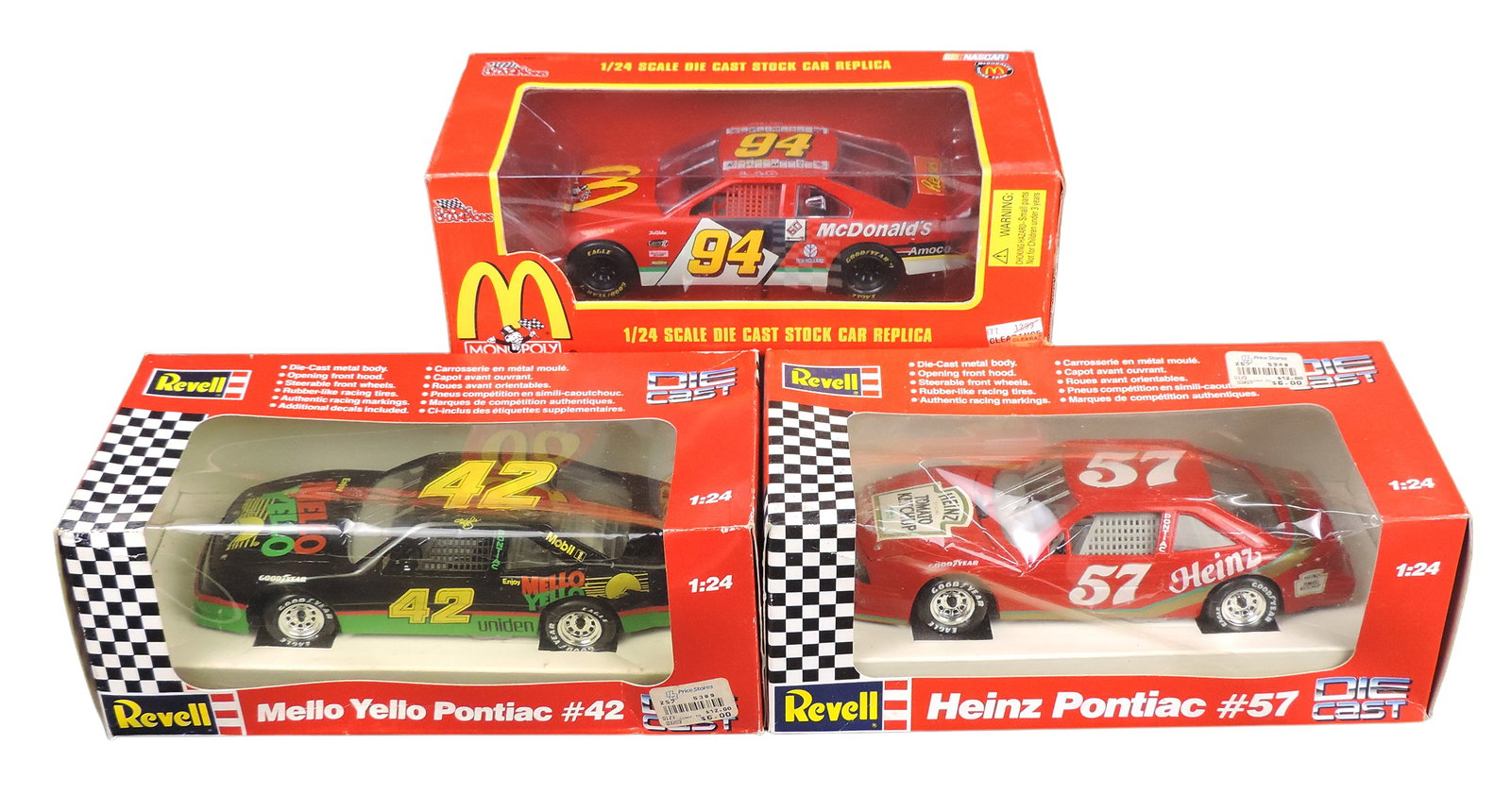 NASCAR Scale Models (3), Kyle Petty, Mellow Yello Pontiac #42, No. 8688, Heinz Pontiac #57, No. 8...: NASCAR Scale Models (3), Kyle Petty, Mellow Yello Pontiac #42, No. 8688, Heinz Pontiac #57, No. 8634, both 1991 by Revell, Inc. & McDonald's Racing Team, 1996 Racing Champions, all 1:24 scale,
