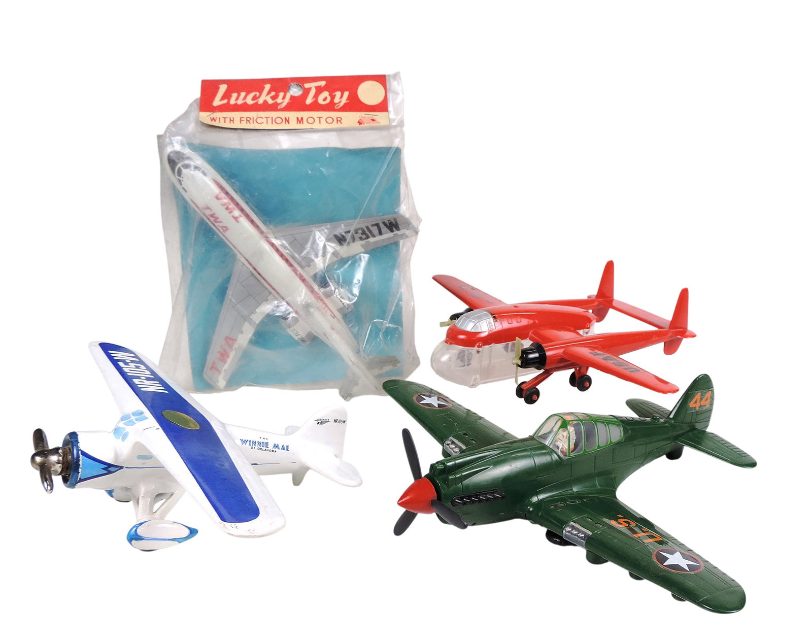 Toy Scale Aviation Models & Decanter (4), NR-105-W, The Winnie Mae of Oklahoma Decanter, c. 1972 ...: Toy Scale Aviation Models & Decanter (4), NR-105-W, The Winnie Mae of Oklahoma Decanter, c. 1972 & painted by hand in Italy, R.E.M. originals (copyright), cork prop, Swadar Fairchild XC-120 red