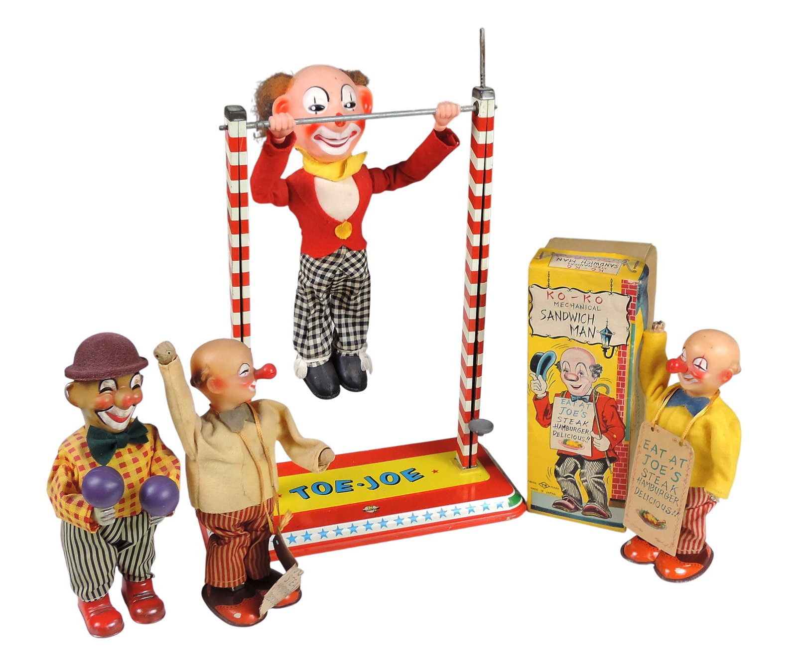Mechanical Toys (4), litho on tin, Ko-Ko Sandwich Man (2), one orig box, loss to hands/missing hat,: Mechanical Toys (4), litho on tin, Ko-Ko Sandwich Man (2), one orig box, loss to hands/missing hat, Russ Berrie windup Clown Maraca Playing, all of these have windup mechanisms that will move but do n