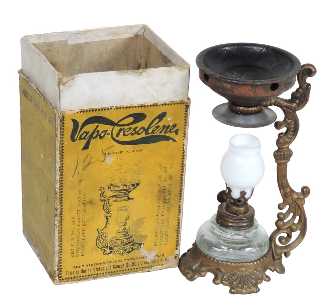 Vapo-Cresolene Vaporizer, Allen & Hanburys, Ltd, Sole Agents for Great Britain-London & Leeming M...: Vapo-Cresolene Vaporizer, Allen & Hanburys, Ltd, Sole Agents for Great Britain-London & Leeming Miles Co., Ltd, Sole Agents for Canada-Montreal, ornate metal stand, small kerosene glass lamp, tin dish