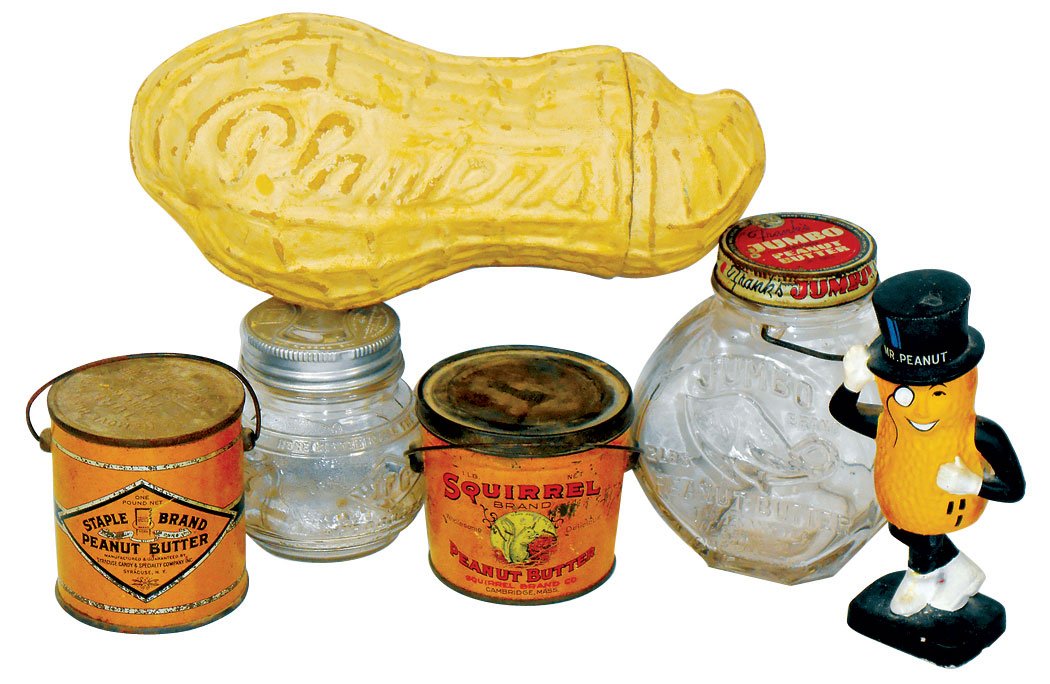 Peanut & peanut butter items (6), Squirrel Brand &: Peanut & peanut butter items (6), Squirrel Brand & Staple Brand 1# tins w/lids (VG & Exc), Planters Mr. Peanut nodder-painted composition by Lego-Japan, large papier-mâché peanut 2-pc container, Fra
