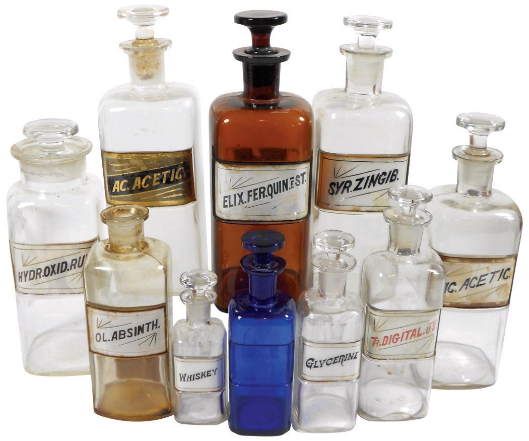 Apothecary bottles (10), label under glass, includes: Apothecary bottles (10), label under glass, includes cobalt blue & amber bottle, c.1890’s, VG cond w/some wear on labels, lgst bottle 10"H x 3.25"W.