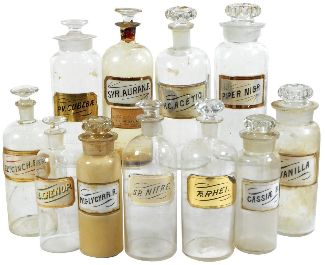 Apothecary bottles (11), label under glass, assorted: Apothecary bottles (11), label under glass, assorted styles, c.1890’s, VG cond w/some wear to labels, up to 10"H.