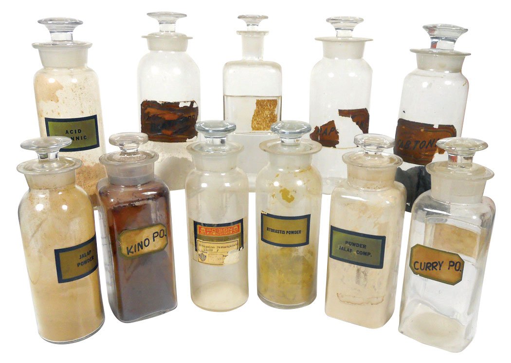Drug store apothecary bottles (11), all w/glass: Drug store apothecary bottles (11), all w/glass stoppers & 10 w/paper labels, incl Jalap Powder, DentifrXX, Fab. Tonka, Potassium Permanganat w/poison label, Acid Tannic, Hydrastis Powder, W. T. & Co.