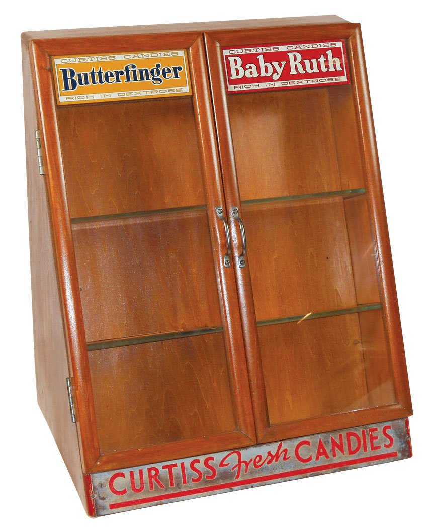 Advertising counter display case for Curtiss: Advertising counter display case for Curtiss Candies-Butterfinger & Baby Ruth Candy Bars, slanted wood case w/glass shelves, Exc cond, 20"H x 17"W.