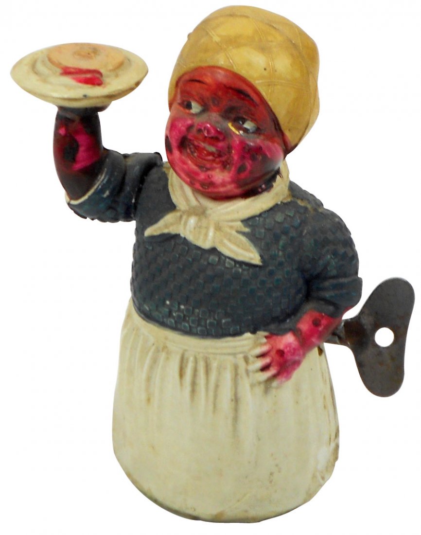 Toy, Black Americana, Aunt Jemima celluloid wind-up: Toy, Black Americana, Aunt Jemima celluloid wind-up w/key, made in Japan, Rare, Exc wkg cond, 4"H x 2.25"W.
