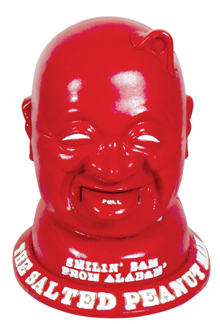 Coin-operated peanut machine, Smilin' Sam The Salted: Coin-operated peanut machine, Smilin' Sam The Salted Peanut Man, 1 Cent, c.1970's version of the orig early 1900's, cast aluminum, Exc working cond, 13.5"H.