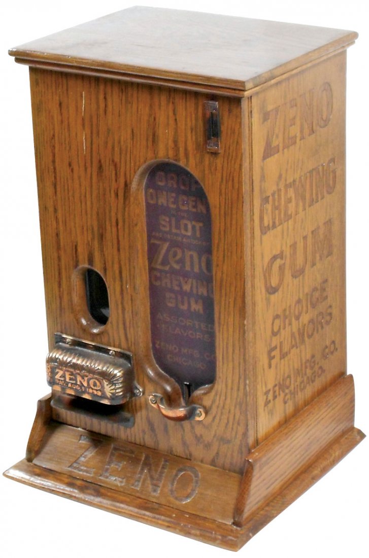 Coin-operated machine, Zeno Chewing Gum, dispenses pkgs: Coin-operated machine, Zeno Chewing Gum, dispenses pkgs of gum for 1 cent, oak case w/pressed adv sides, paper operating sheet inside back door, complete w/keys, c.1890's, Exc cond w/correct replaceme
