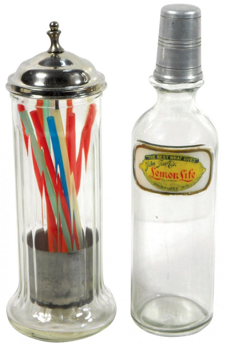 Soda fountain syrup bottle & straw holder (2), Lemon: Soda fountain syrup bottle & straw holder (2), Lemon Life LUG back bar bottle w/pour cap, 12.5"H x 3.25"Dia & clear glass straw holder w/original early lid w/lift insert, 12"H x 4.5"bottom Dia, both E