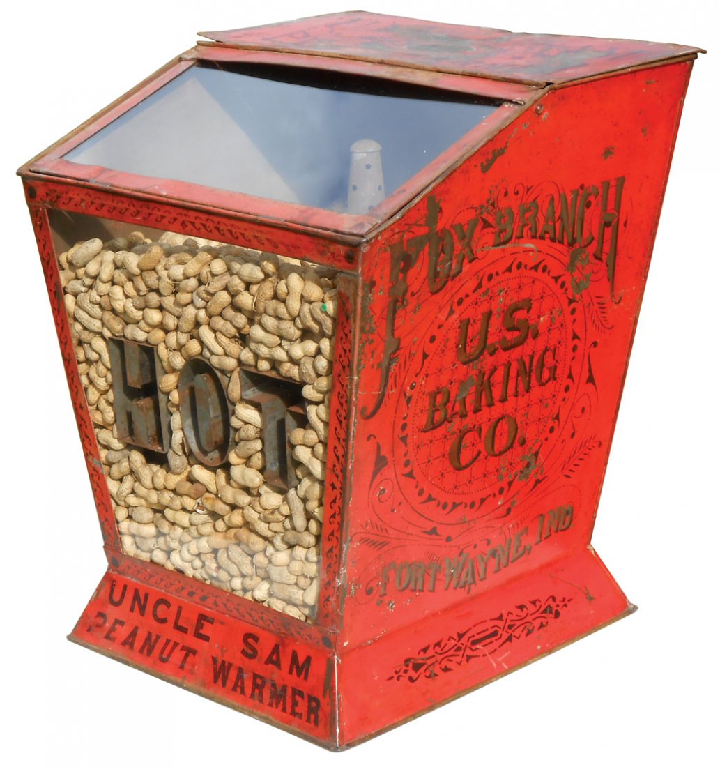 Country store Uncle Sam Peanut Warmer, c.1900, litho on: Country store Uncle Sam Peanut Warmer, c.1900, litho on metal counter display from U.S. Baking Co.-Ft. Wayne, Ind, Rare, some roughness on top panel, o/wise VG cond, 22"H.