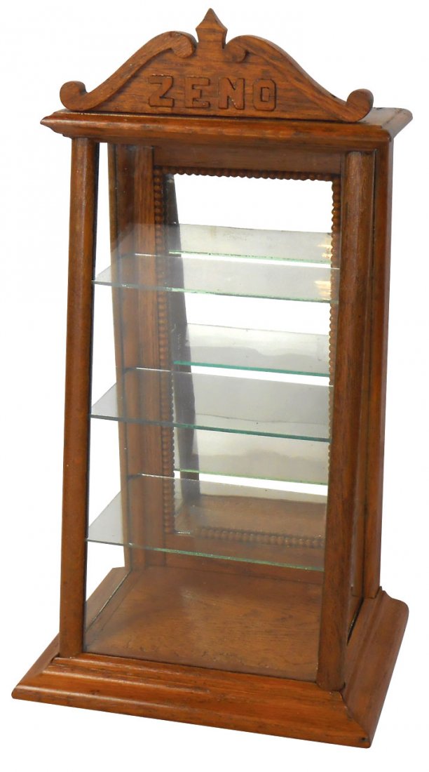Zeno Chewing Gum display case, oak w/slanted front &: Zeno Chewing Gum display case, oak w/slanted front & adv marquee, beaded mirrored back door, all orig, Exc cond, 18"H x 9.5"W x 7.5"D.