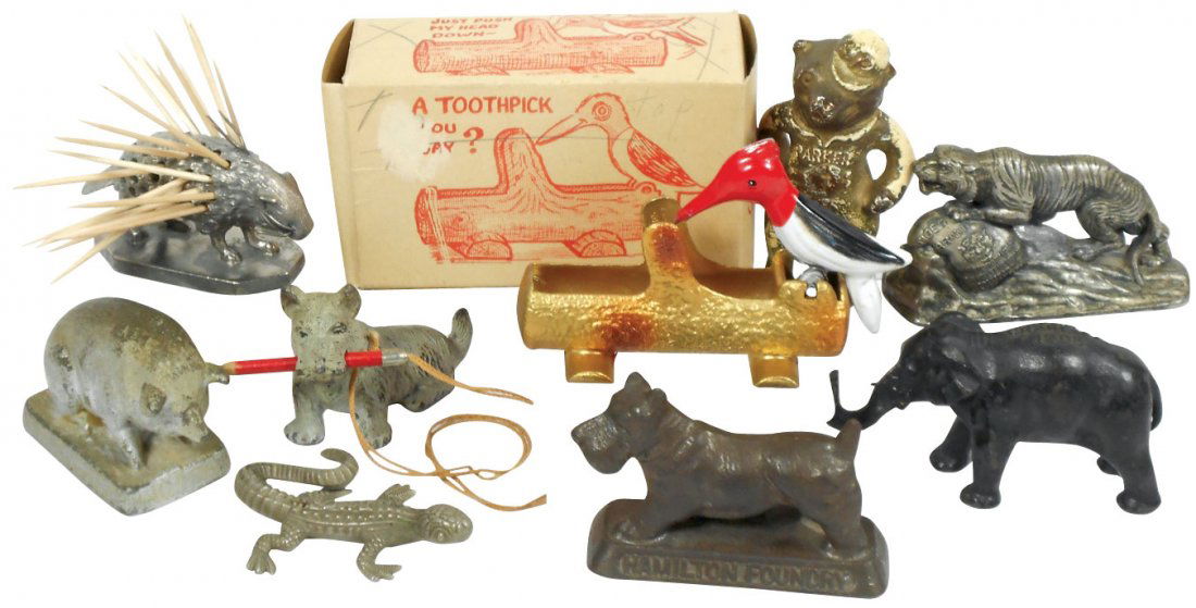 Figural & advertising paperweights (8), "Parker Vises": Figural & advertising paperweights (8), "Parker Vises" bear, "Pig Iron" pig, "Tiger Brand White Rock Finish" tiger, "RH Co" lizard, "Crane Co" elephant, "Hamilton Foundry" Scottie Dog, 2 toothpick hol