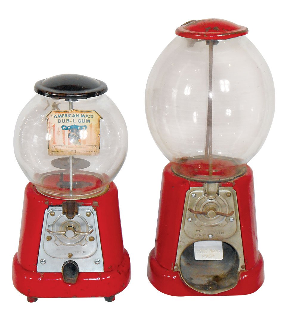 Coin-operated machines (2), Advance "Big Mouth" bulk: Coin-operated machines (2), Advance "Big Mouth" bulk vendor, VG cond w/orig red paint, 16"H & Advance gumball w/American made Bub-L-Gum 1 Cent decal, orig red paint, 13"H.