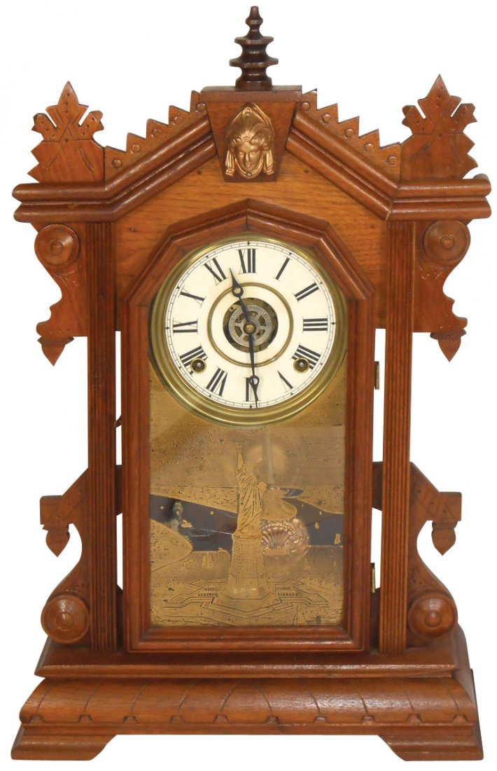 Clock, Ingraham mantle, walnut w/carved front & Statue