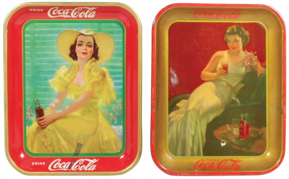 Coca-Cola serving trays (2), c.1936 & 1938, American: Coca-Cola serving trays (2), c.1936 & 1938, American Art Works litho on metal, 1936 in VG cond w/minor paint loss to interior & edge wear, 1938 in VG+ cond w/minor discoloration at bottom, 13.5"H x 10