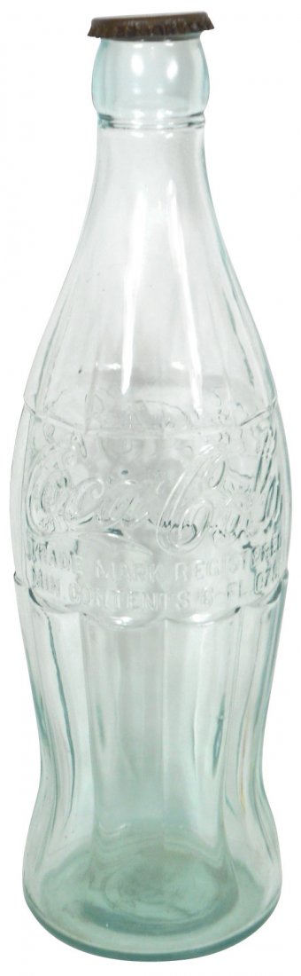Coca-Cola counter display Christmas bottle, glass: Coca-Cola counter display Christmas bottle, glass w/metal cap, "Pat. D" version, bottle in Mint cond w/VG cap, 20"H x 6"Dia.