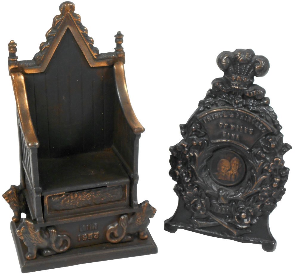 Still banks (2), English Throne (Elizabeth II), John: Still banks (2), English Throne (Elizabeth II), John Harper, Ltd., England, 1953, cast iron & Prince & Princess of Wales (Ser #129/1000), Robert Brown, Wales, 1981, zinc alloy, both Exc cond, throne 8