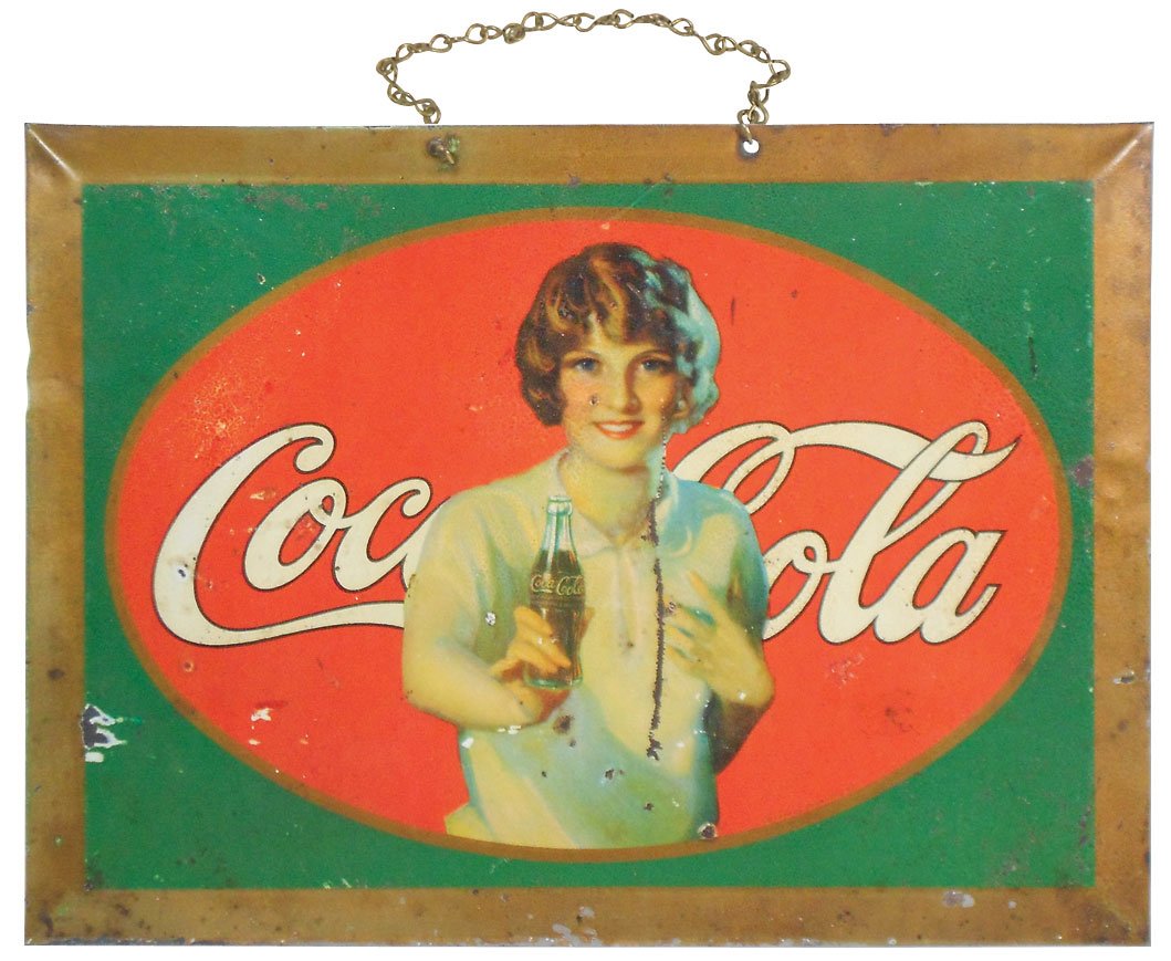 Coca-Cola sign, pretty girl extending a bottle w/a: Coca-Cola sign, pretty girl extending a bottle w/a smile, c.1926, litho on metal, Good cond w/some paint loss & 3.5" vertical scratch on figure, 8"H x 11"W.